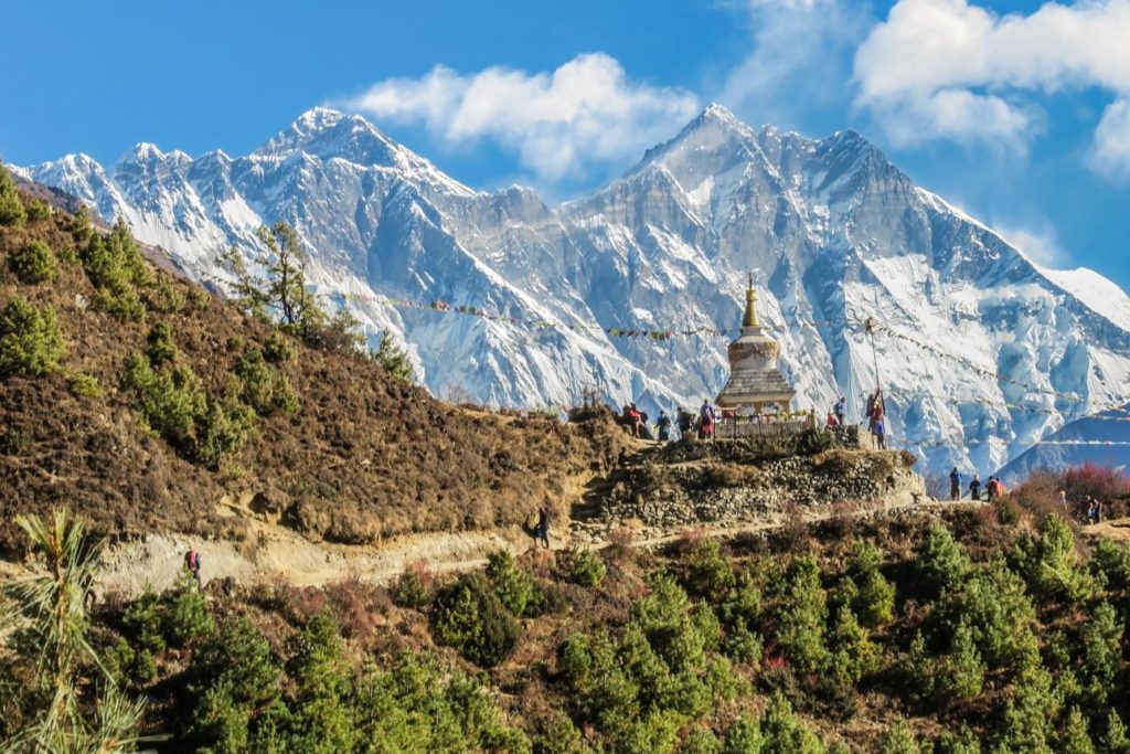 Stupa near Namche Bazar and Mount Everest, Lhotse south rock face - way to Everest base camp